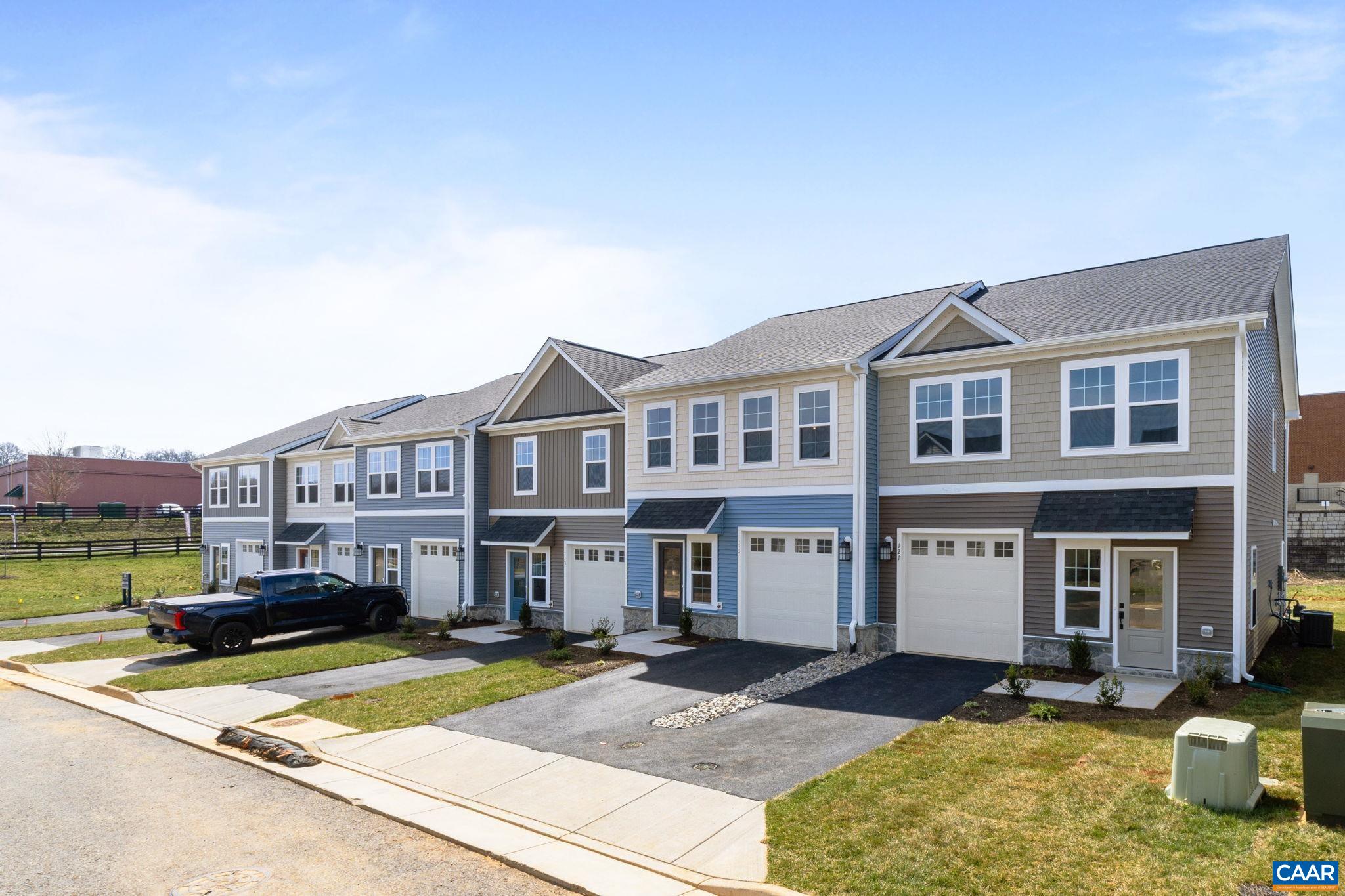 313 Ridgeline Drive Waynesboro, VA 22980 - Photo 2 of 34 a view of a big house with a yard and sitting area
