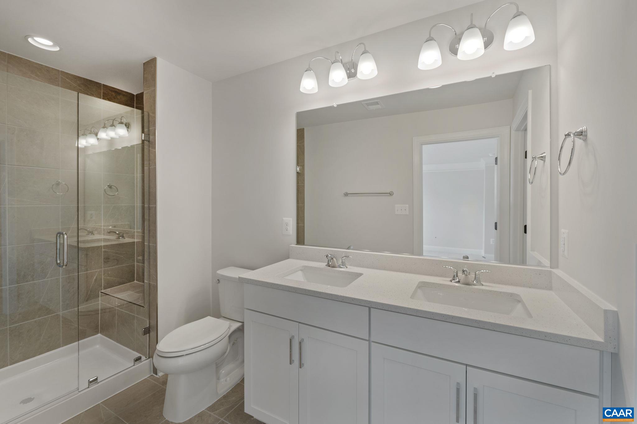 313 Ridgeline Drive Waynesboro, VA 22980 - Photo 25 of 34 a bathroom with a sink a toilet and shower