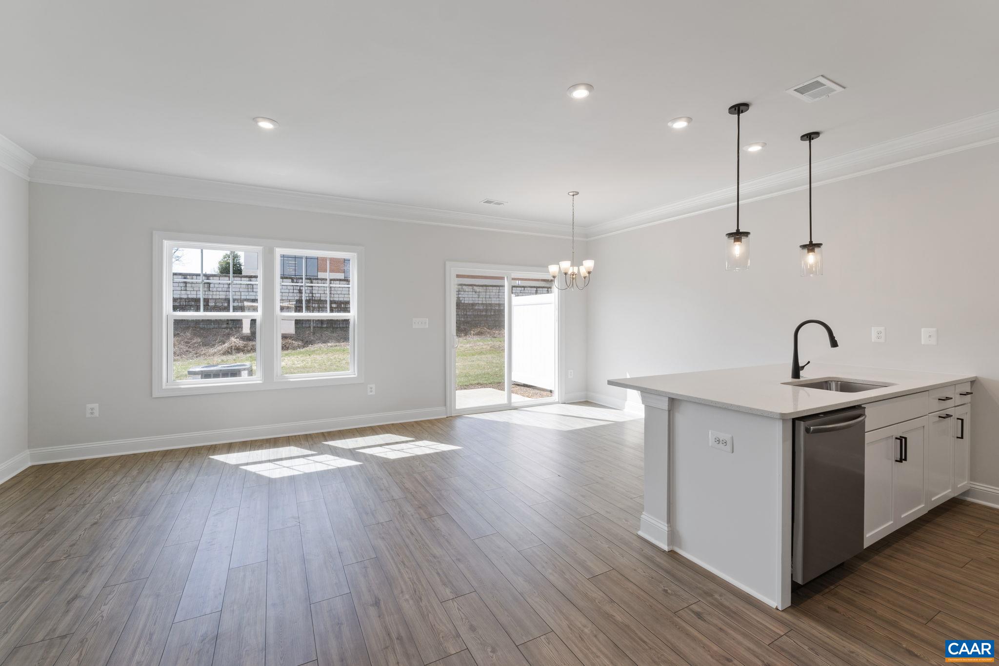 313 Ridgeline Drive Waynesboro, VA 22980 - Photo 7 of 34 a view of a kitchen with sink and wooden floor