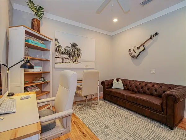 a living room with furniture and a couch