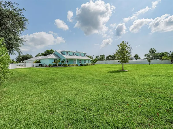 a view of yard with playground and green space