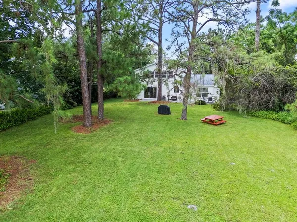 a childrens park with lots of swings and slides