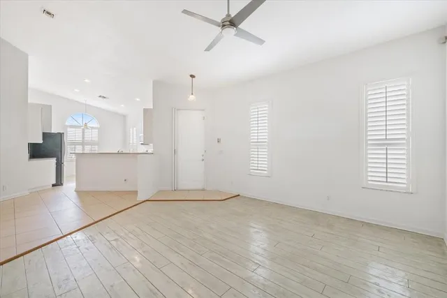a view of a kitchen with marble kitchen and cabinets