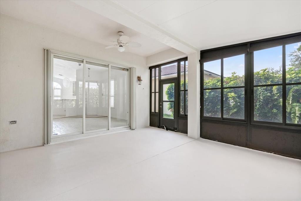 6300 Spring Lake Terrace Fort Pierce, FL 34951 - Photo 34 of 54 a view of an empty room with windows and a balcony