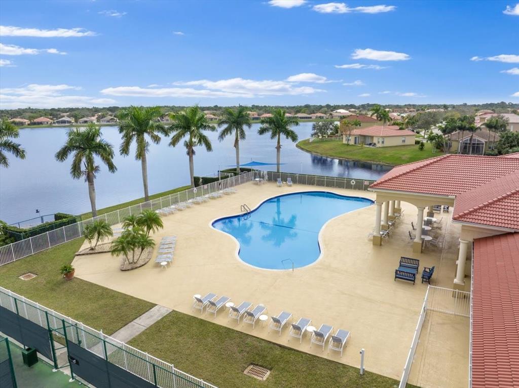 6300 Spring Lake Terrace Fort Pierce, FL 34951 - Photo 38 of 54 a view of a swimming pool with an ocean view