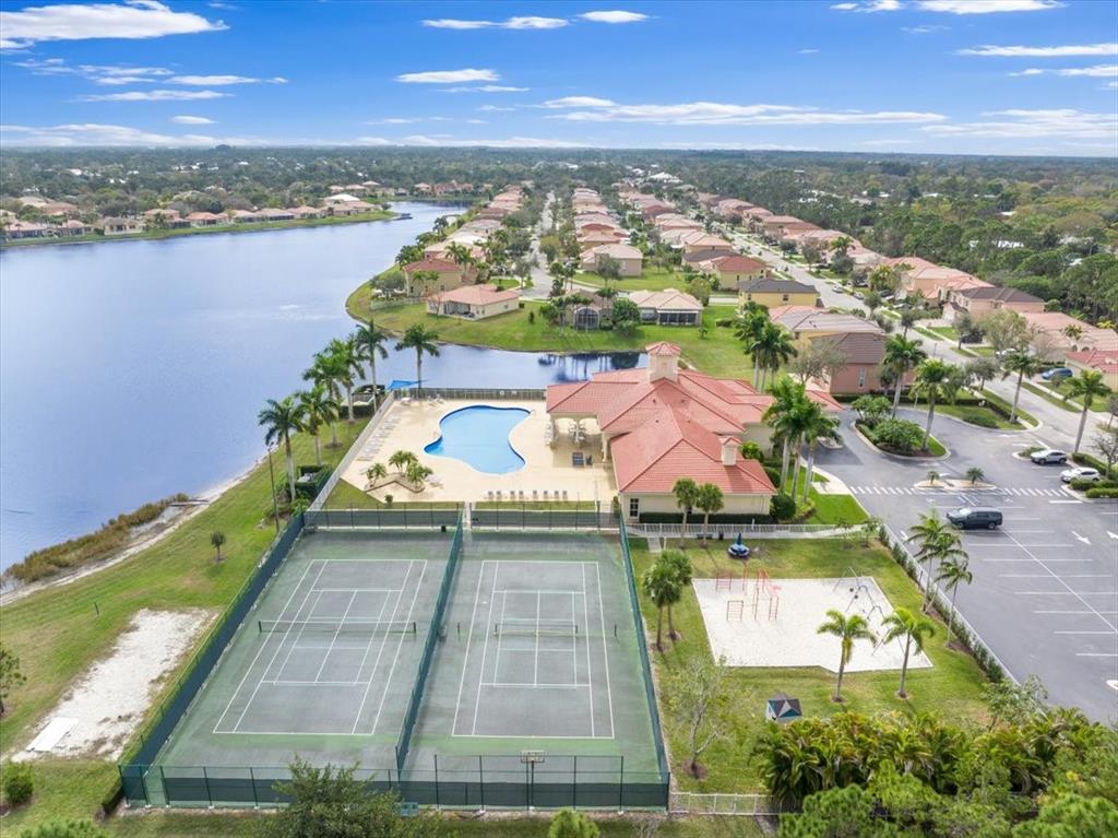 6300 Spring Lake Terrace Fort Pierce, FL 34951 - Photo 40 of 54 an aerial view of residential houses with outdoor space