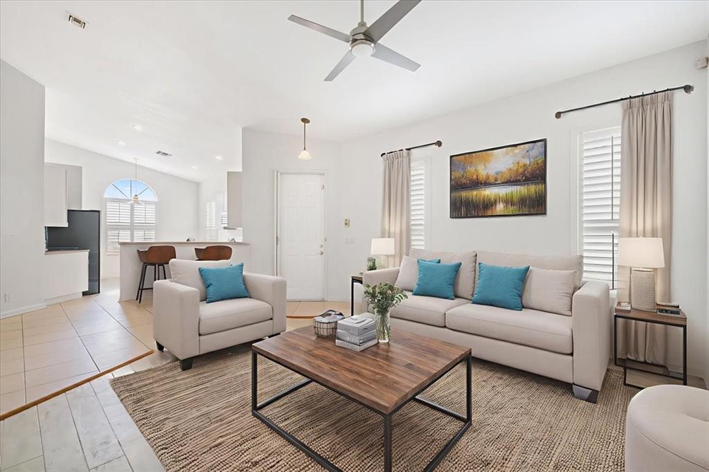 6300 Spring Lake Terrace Fort Pierce, FL 34951 - Photo 53 of 54 a living room with furniture kitchen view and a window