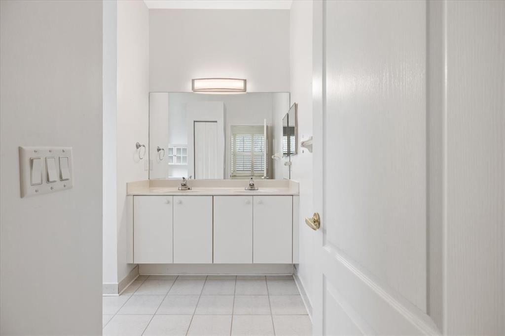 6300 Spring Lake Terrace Fort Pierce, FL 34951 - Photo 6 of 54 a bathroom with a sink and a mirror