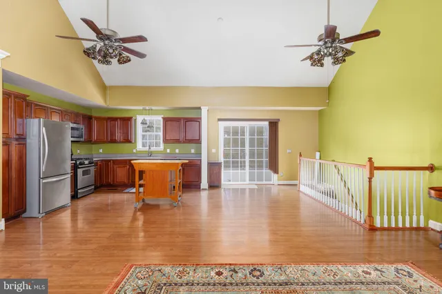 a view of a kitchen with furniture and a rug