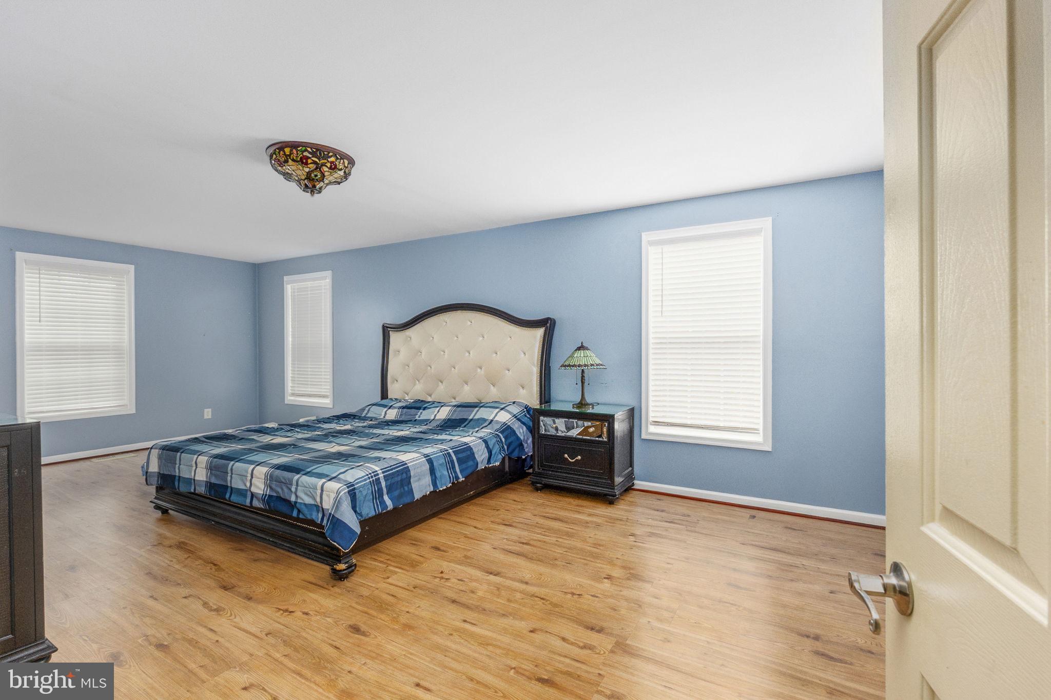 8314 Myrtle Lane King George, VA 22485 - Photo 16 of 40 a bedroom with a bed and a window