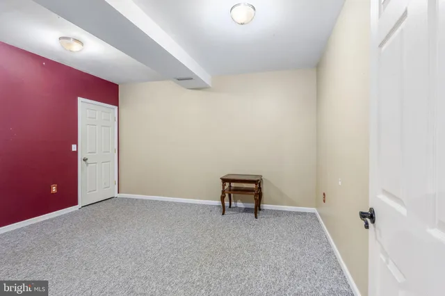 an empty room with a workbench