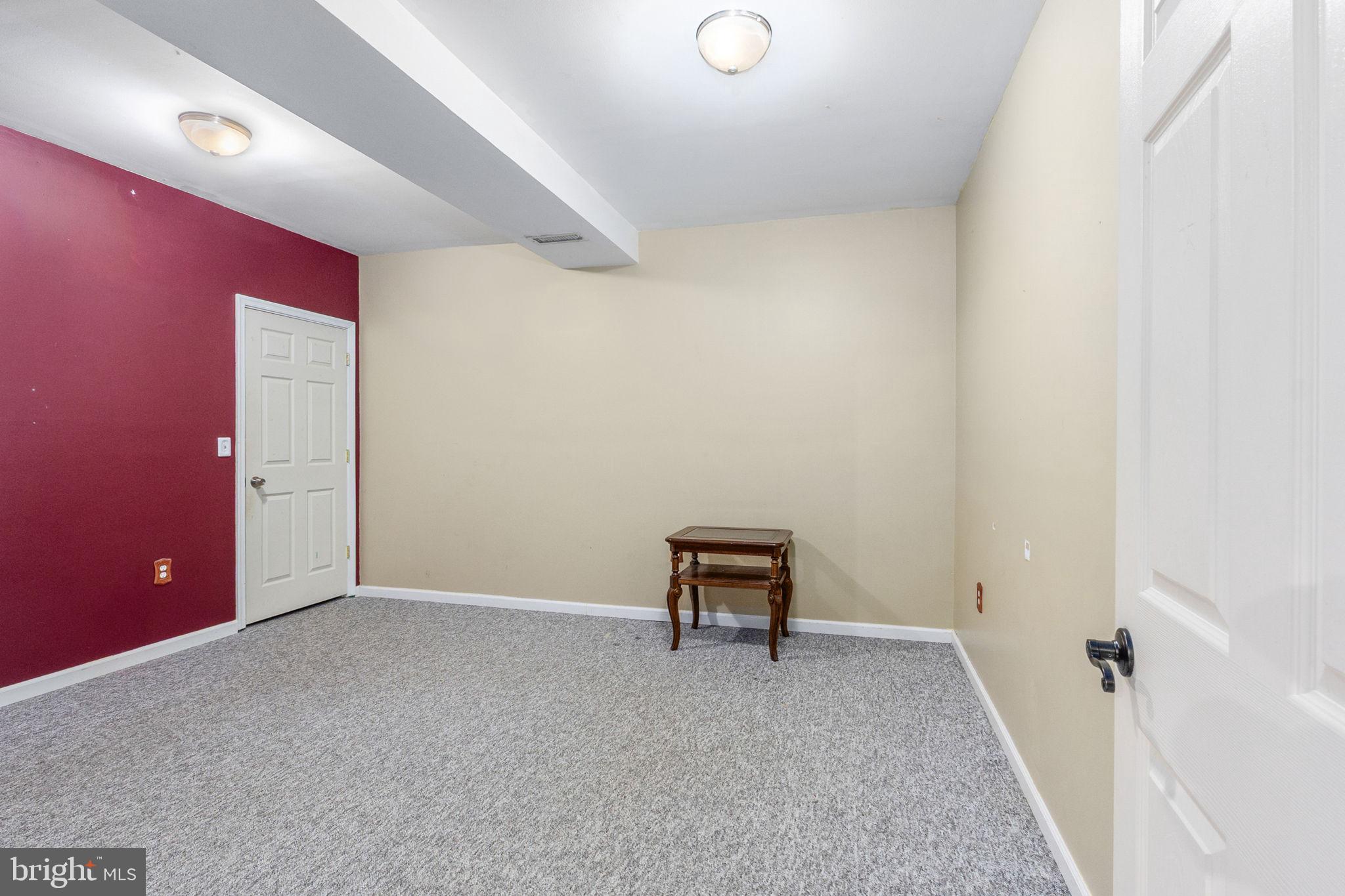 8314 Myrtle Lane King George, VA 22485 - Photo 27 of 40 an empty room with a workbench