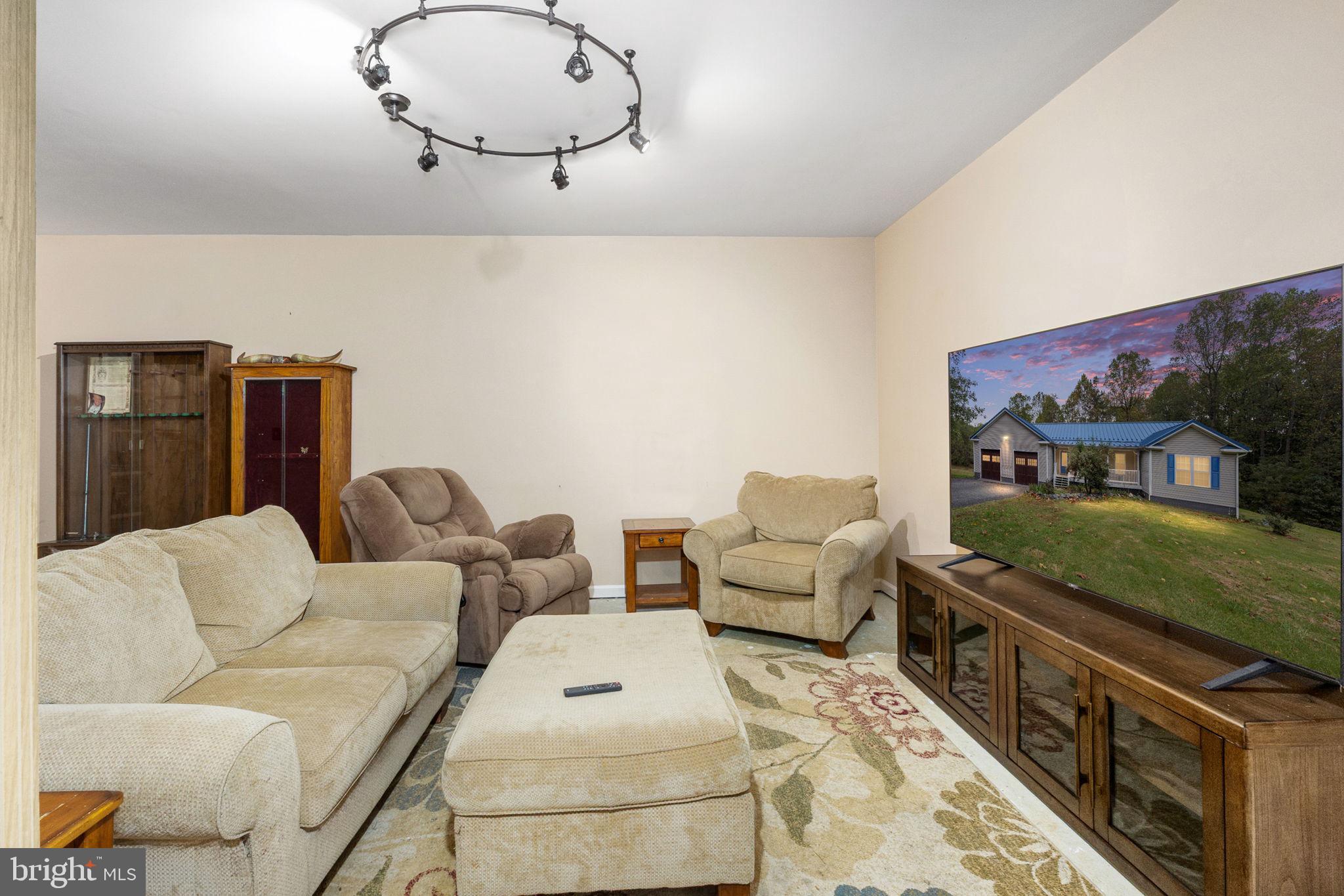 8314 Myrtle Lane King George, VA 22485 - Photo 33 of 40 a living room with furniture