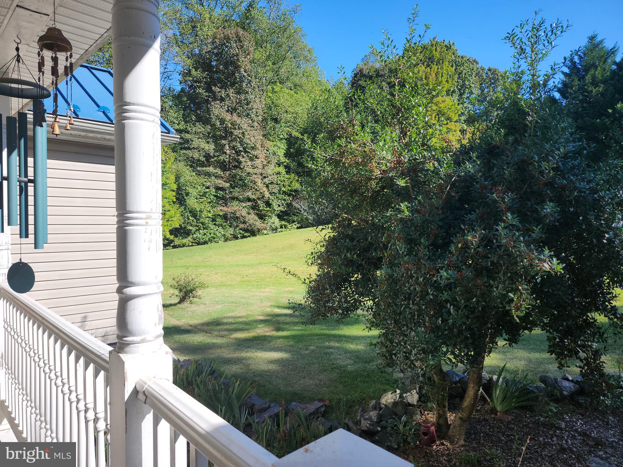8314 Myrtle Lane King George, VA 22485 - Photo 6 of 40 a view of a wooden deck and a backyard