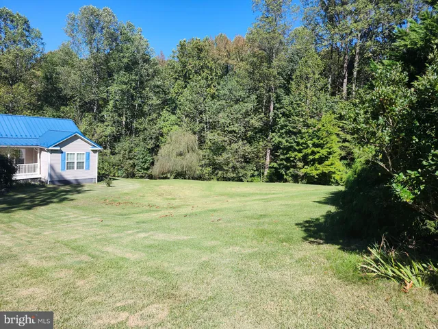 a balcony with trees in front of it
