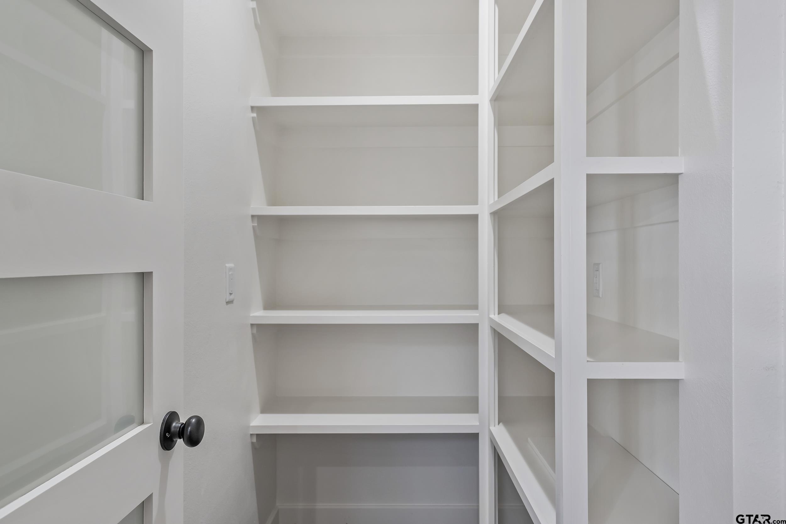 16919 Sawyer Way Lindale, TX 75771 - Photo 11 of 43 a view of an empty walk in closet