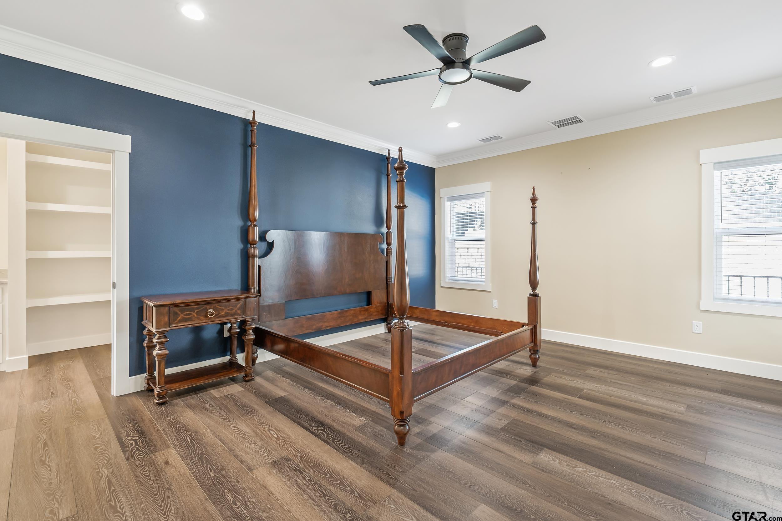 16919 Sawyer Way Lindale, TX 75771 - Photo 14 of 43 a living room with wooden floor and a ceiling fan