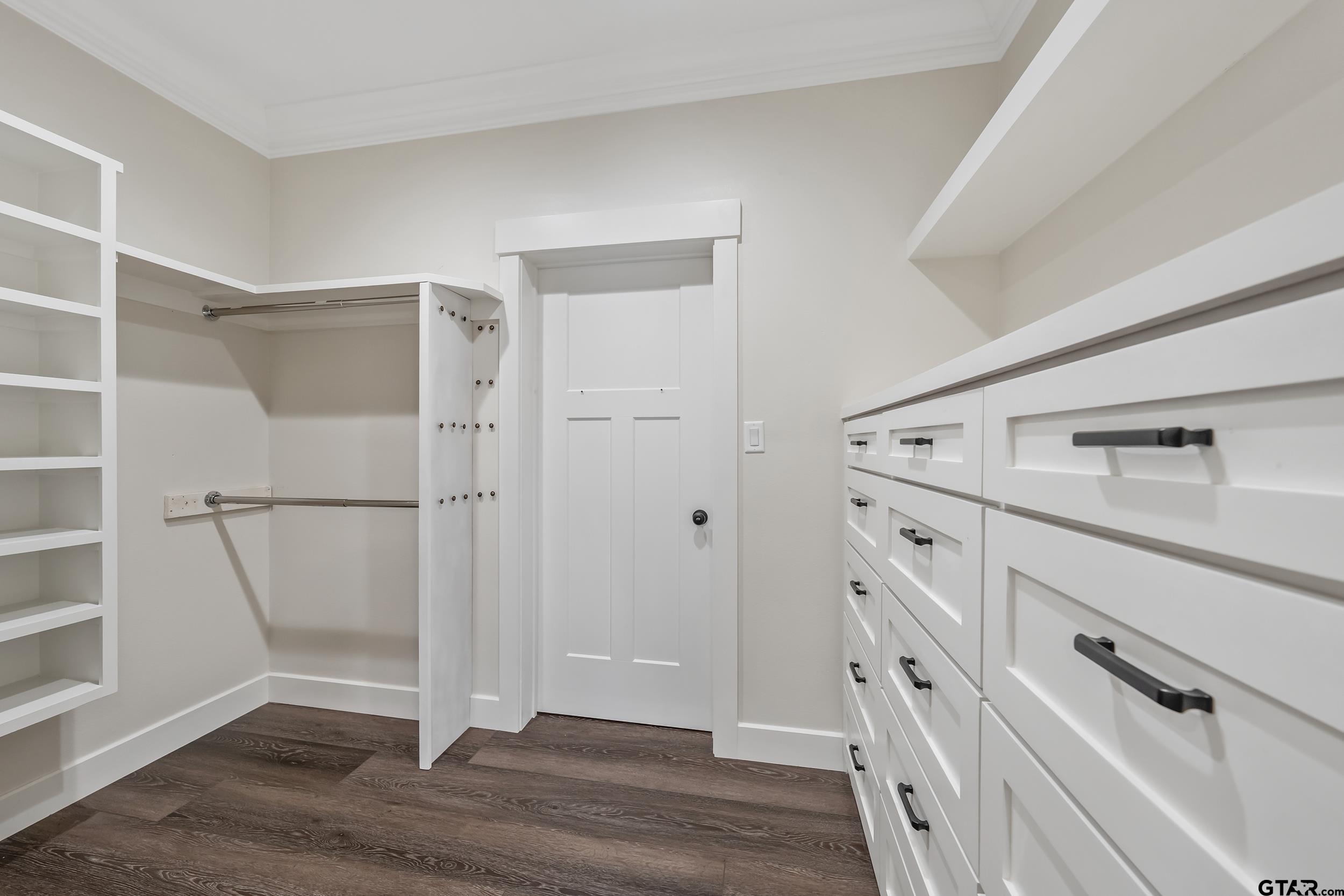 16919 Sawyer Way Lindale, TX 75771 - Photo 19 of 43 a view of an empty walk in closet