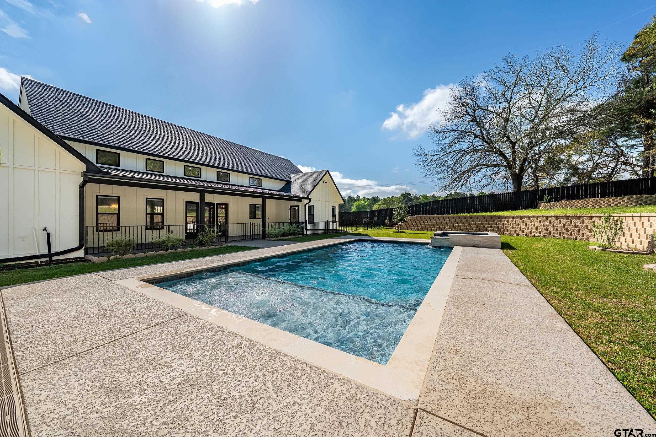 16919 Sawyer Way Lindale, TX 75771 - Photo 35 of 43 swimming pool view with a garden space