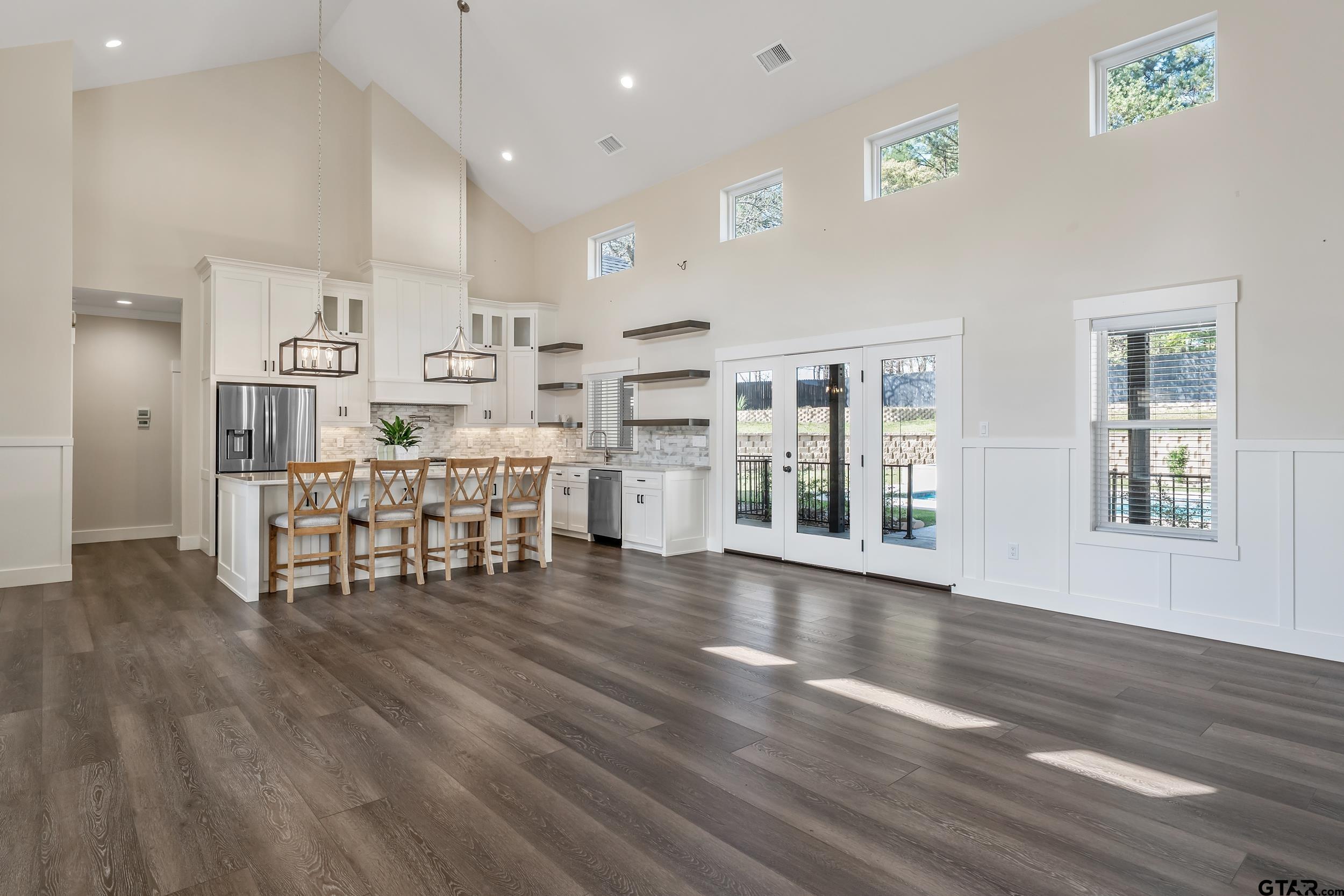 16919 Sawyer Way Lindale, TX 75771 - Photo 8 of 43 a view of a kitchen with furniture and wooden floor