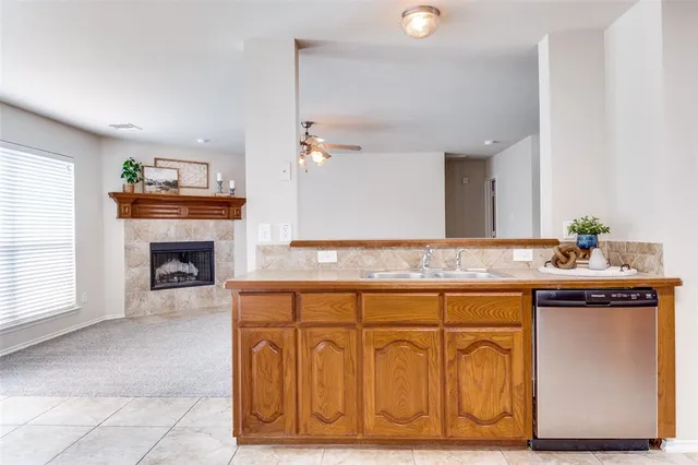 a kitchen with a stove and cabinets