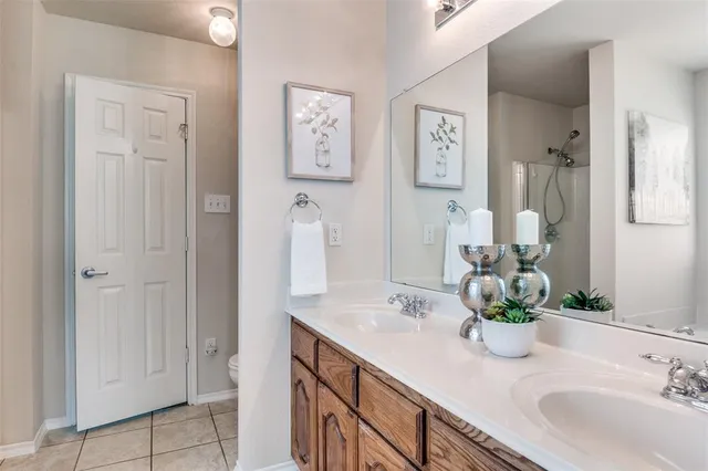 a bathroom with a sink a vanity and a mirror