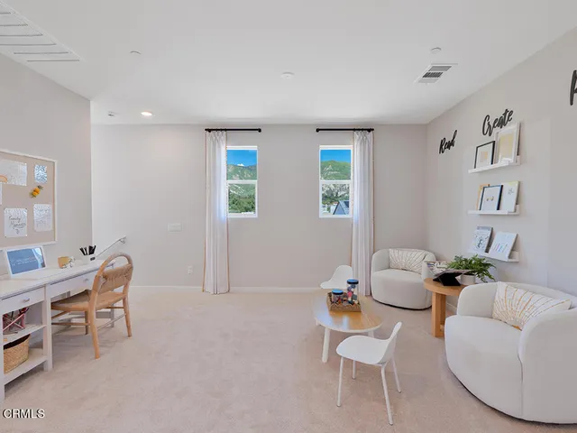 a room with furniture and a window