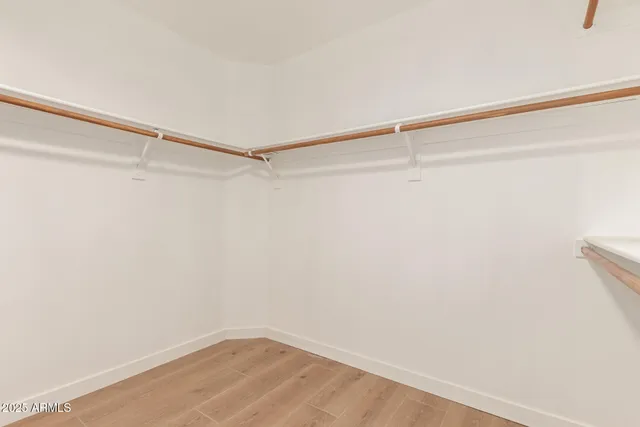 a view of a room with racks on the wall