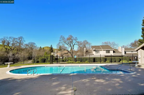 a view of backyard with green space