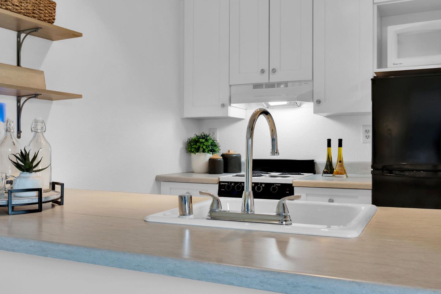 244 Stonegate Circle San Jose, CA 95110 - Photo 11 of 38 a living room with furniture and a flat screen tv