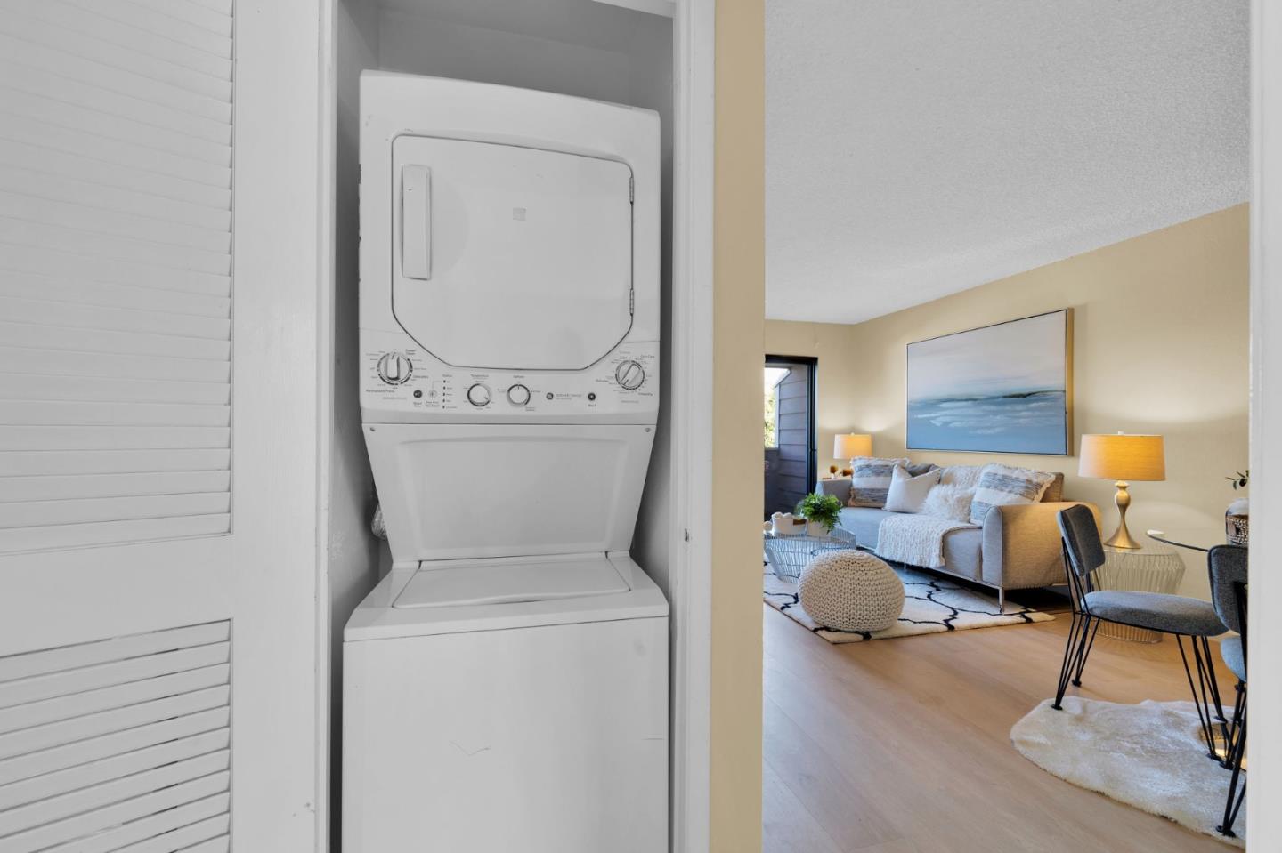 244 Stonegate Circle San Jose, CA 95110 - Photo 16 of 38 a living room with furniture and a wooden floor