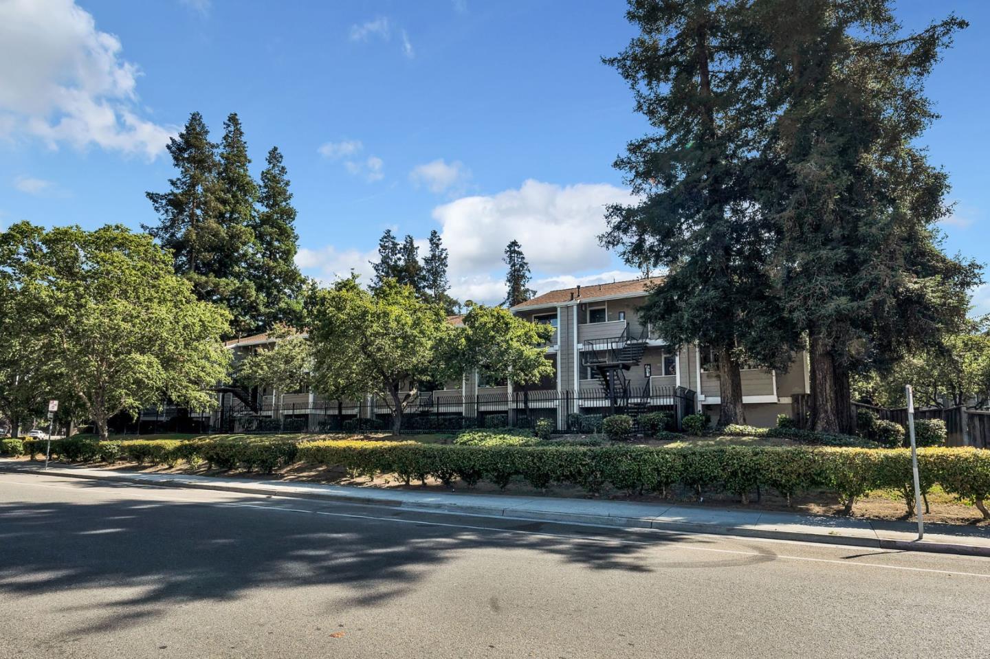 244 Stonegate Circle San Jose, CA 95110 - Photo 28 of 38 a front view of a house with a garden and tree