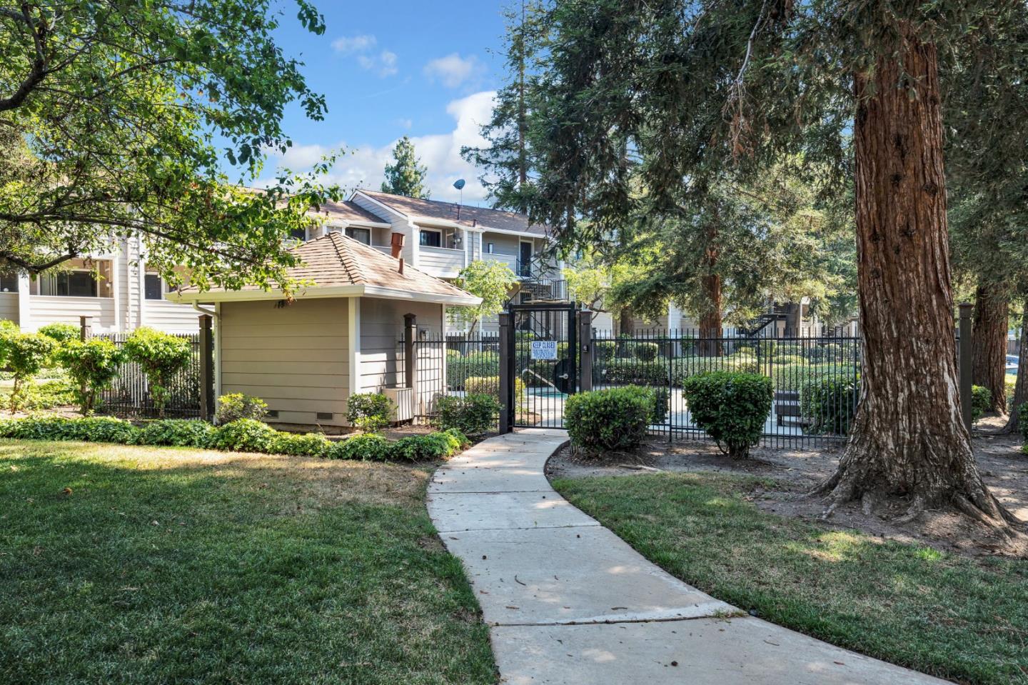 244 Stonegate Circle San Jose, CA 95110 - Photo 32 of 38 front view of a house with a yard
