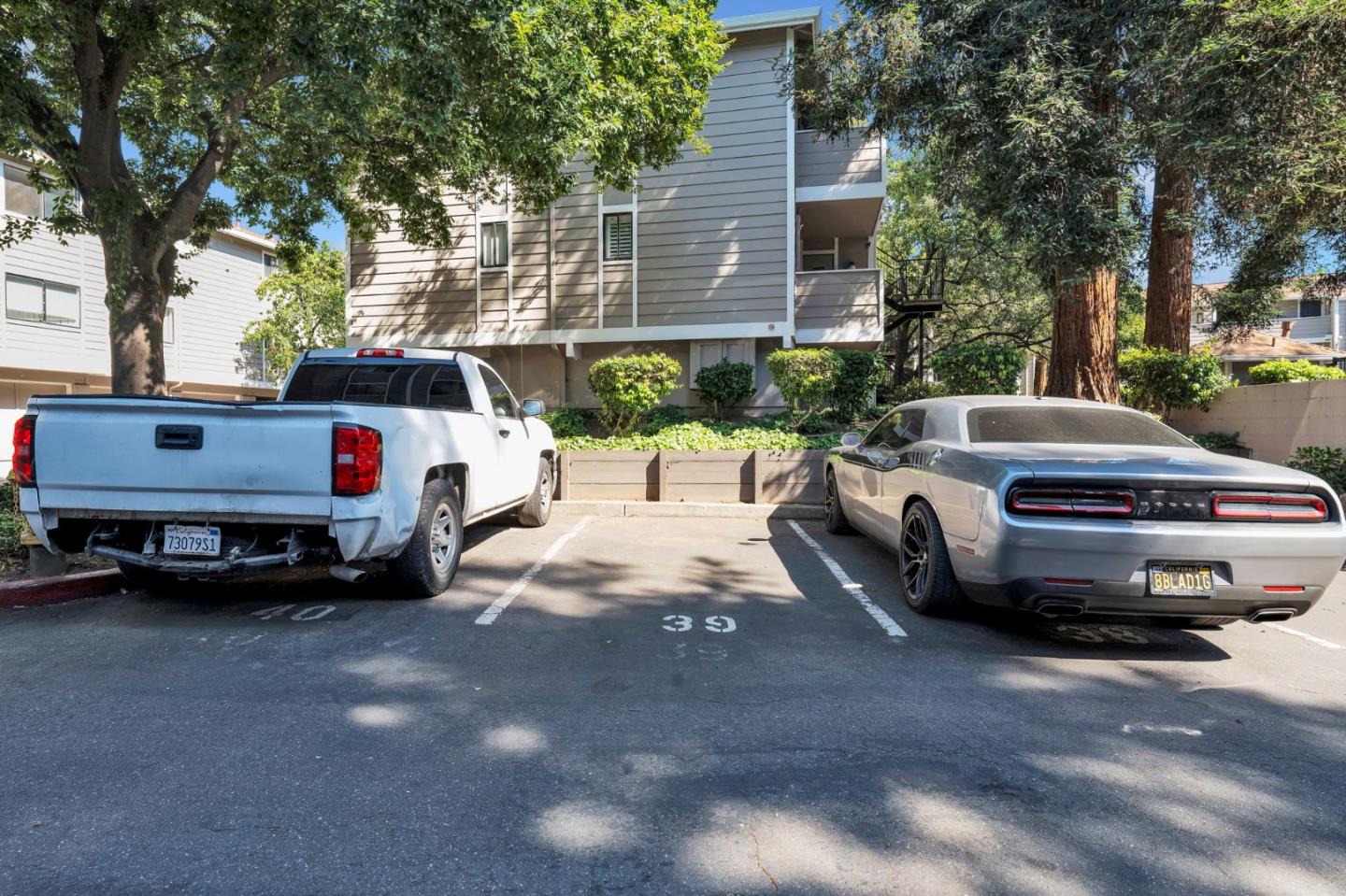 244 Stonegate Circle San Jose, CA 95110 - Photo 34 of 38 a car parked in front of a house