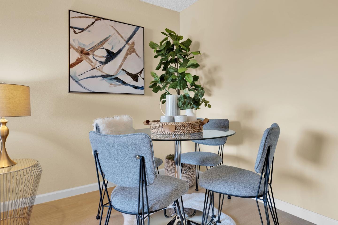 244 Stonegate Circle San Jose, CA 95110 - Photo 7 of 38 a view of a dining room with furniture and wooden floor