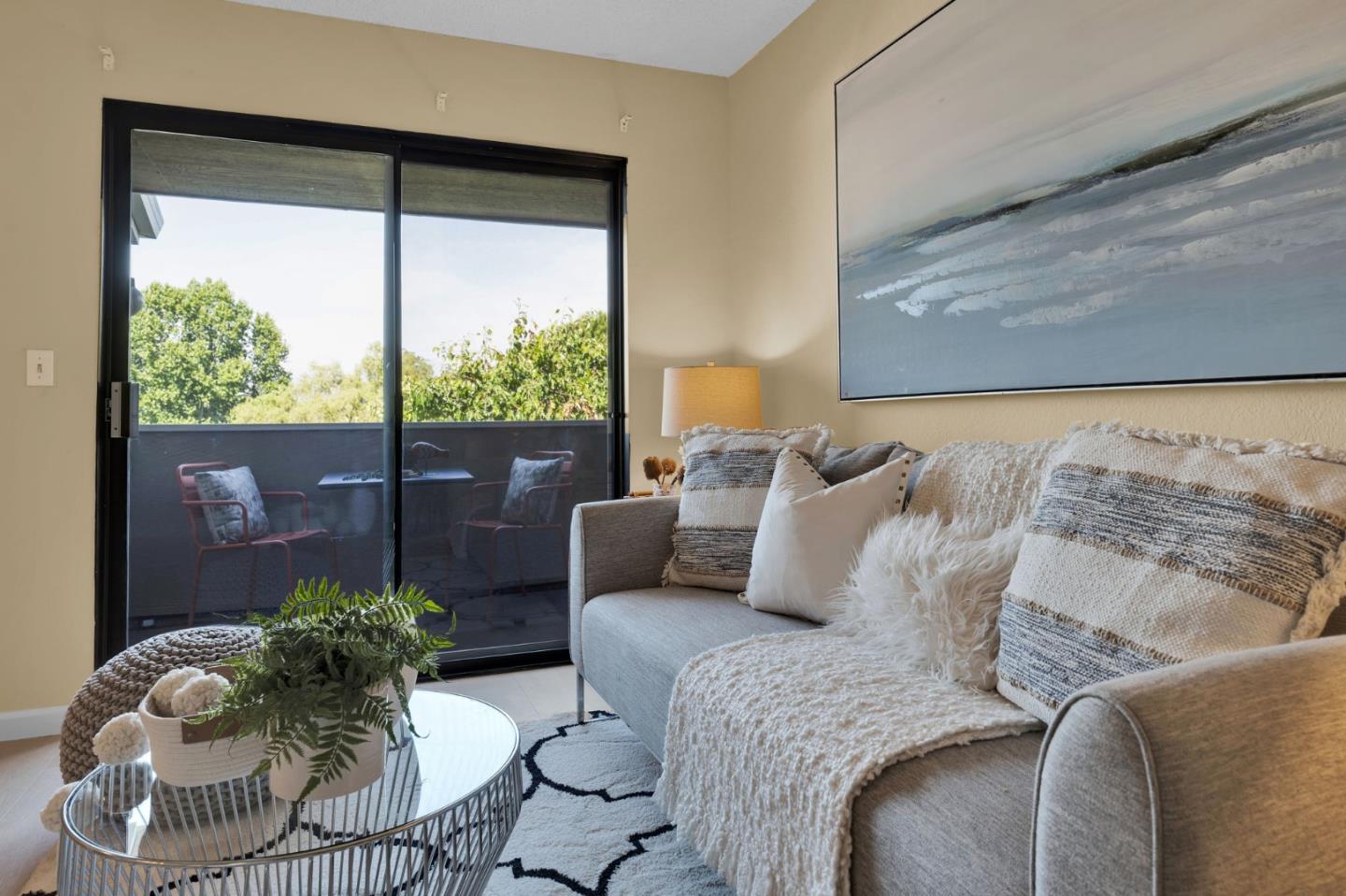 244 Stonegate Circle San Jose, CA 95110 - Photo 8 of 38 a bedroom with a large bed and a large window