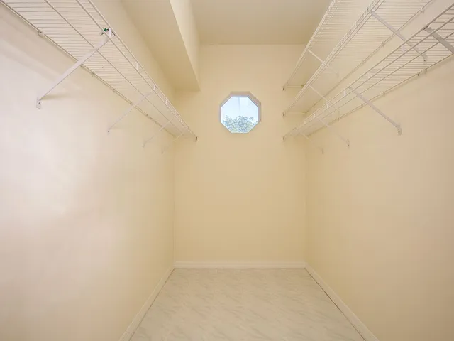 a view of a small space with racks on the wall