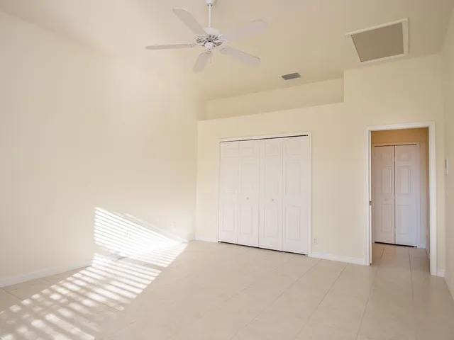 a view of a closet area with an empty space