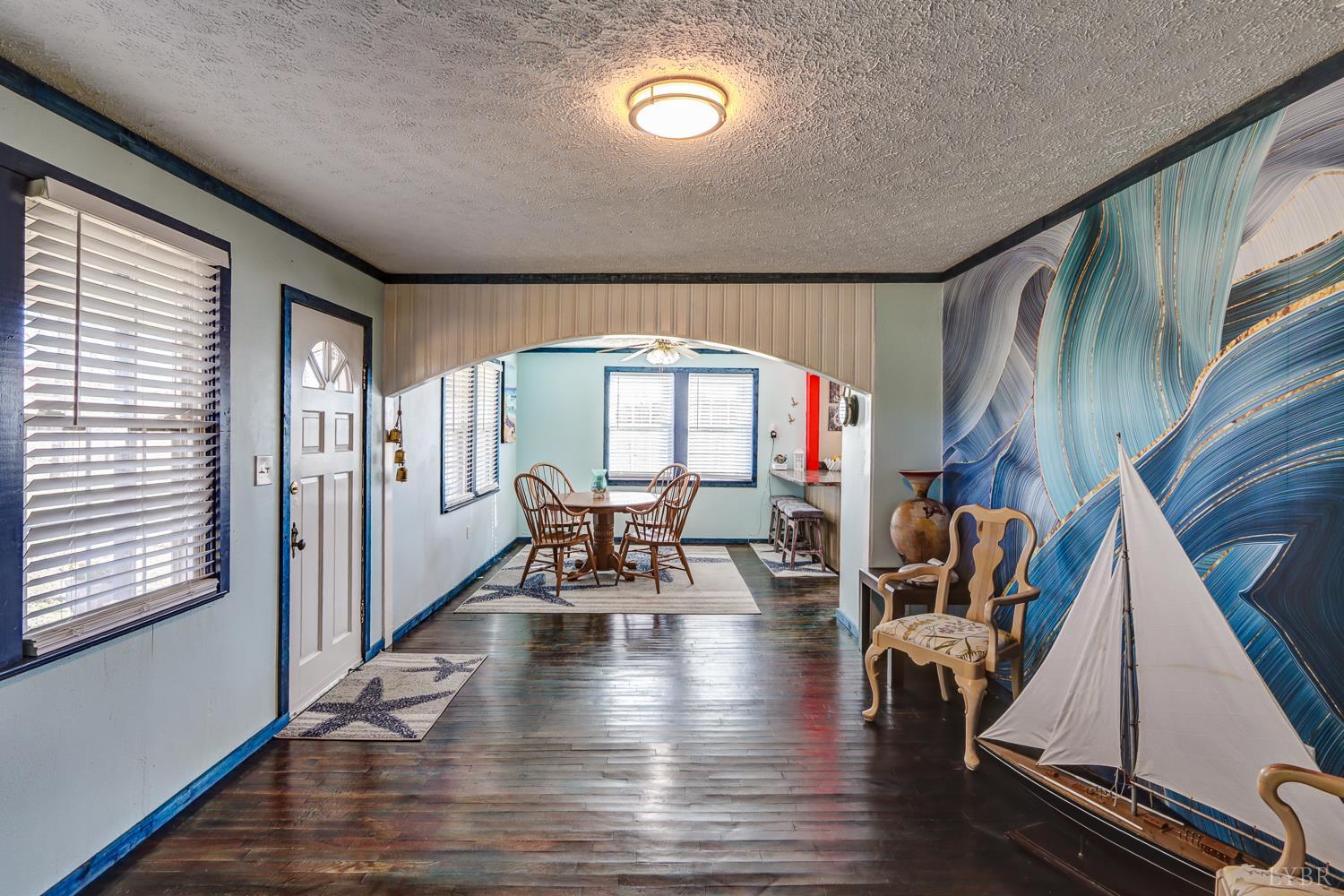 3292 Payneton Road Chatham, VA 24531 - Photo 19 of 48 a living room with furniture and a large window