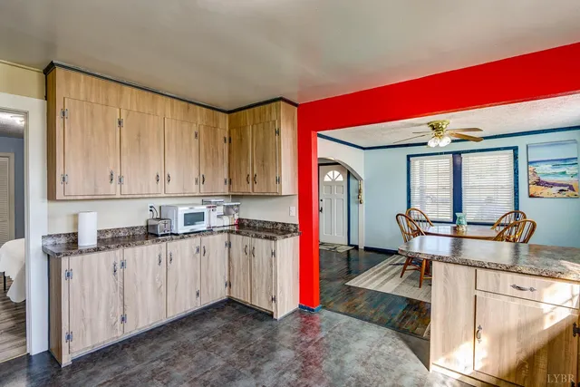 a kitchen with stainless steel appliances granite countertop a sink and cabinets