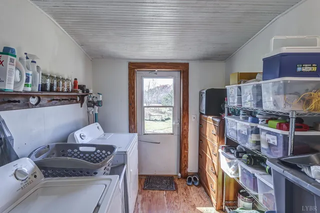 a kitchen with stainless steel appliances granite countertop a stove and a refrigerator