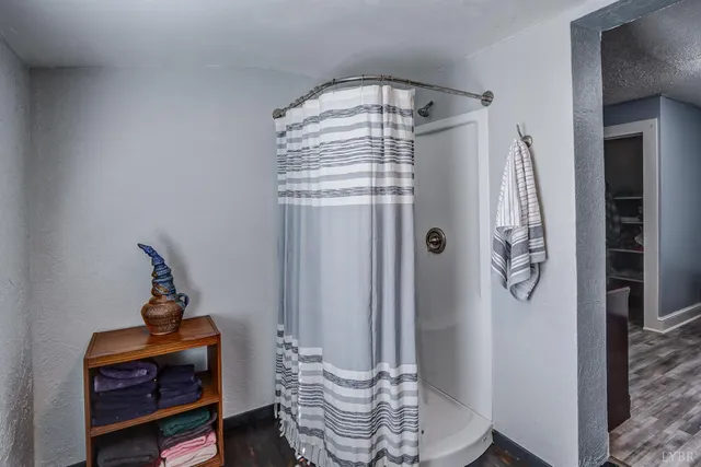 a room with furniture and wooden floor