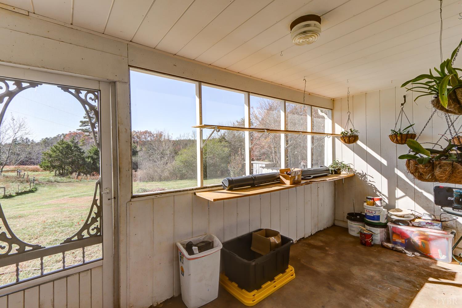 3292 Payneton Road Chatham, VA 24531 - Photo 40 of 48 a view of a balcony with chair and table in the balcony