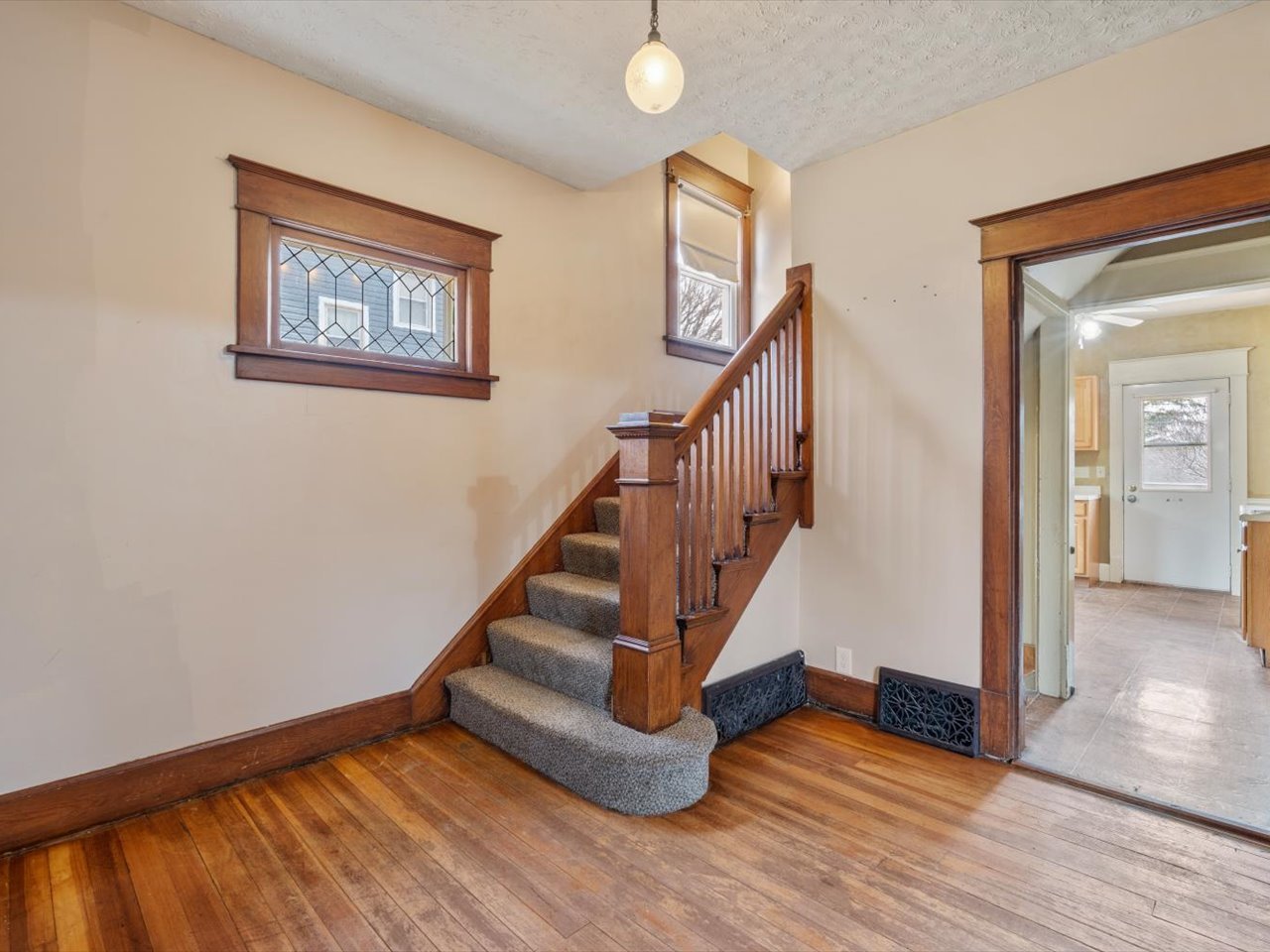 2416 21st Avenue Rock Island, IL 61201 - Photo 24 of 26 a view of entryway with wooden floor and stairs