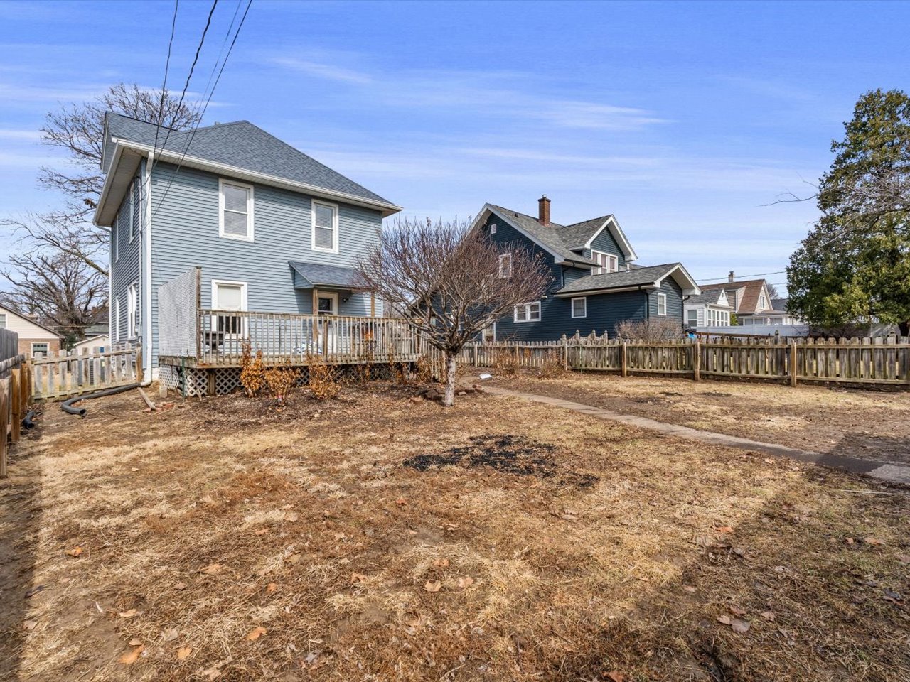 2416 21st Avenue Rock Island, IL 61201 - Photo 6 of 26 a front view of a house with a yard