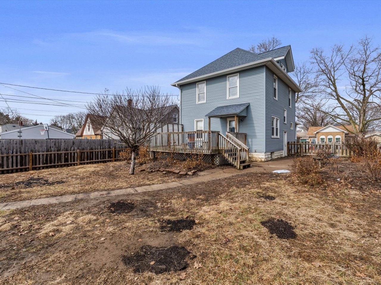 2416 21st Avenue Rock Island, IL 61201 - Photo 7 of 26 a view of a house with a yard