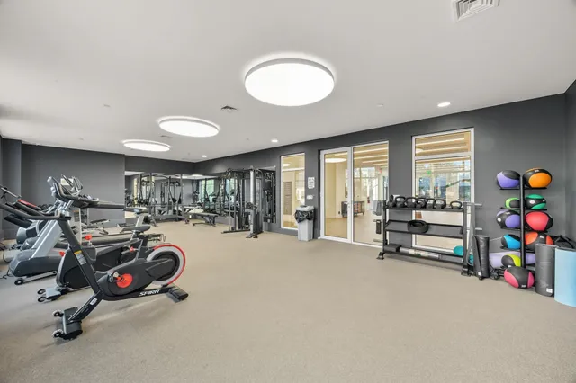 a view of a room with gym equipment