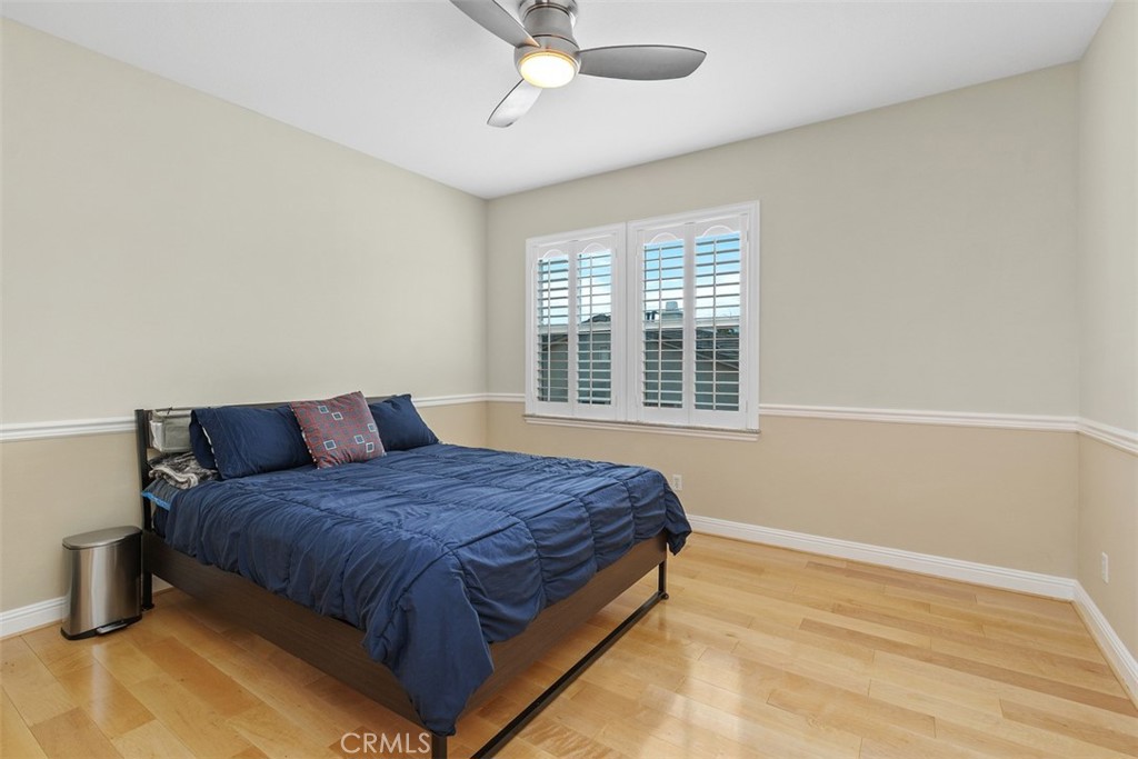 13337 Hunt Club Drive Rancho Cucamonga, CA 91739 - Photo 27 of 45 Upstairs bedroom with ceiling fan and shutters
