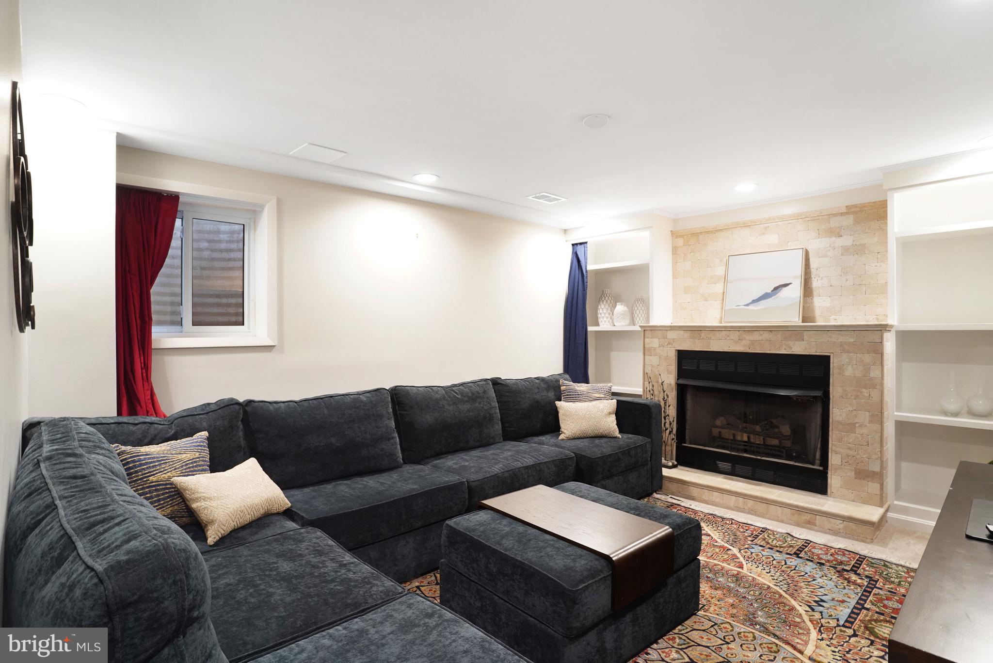 8428 Grenoble Court Springfield, VA 22152 - Photo 29 of 41 LL Family room with gas fireplace