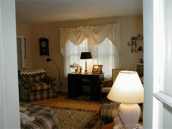 2 Russell Hill Road Ashburnham, MA 01430 - Photo 14 of 18 a bed room with a bed and a chair